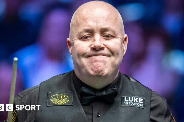 Vintage Higgins beats Selby in Tour Championship final