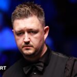 Wilson has medical attention in Tour Championship loss to Ding