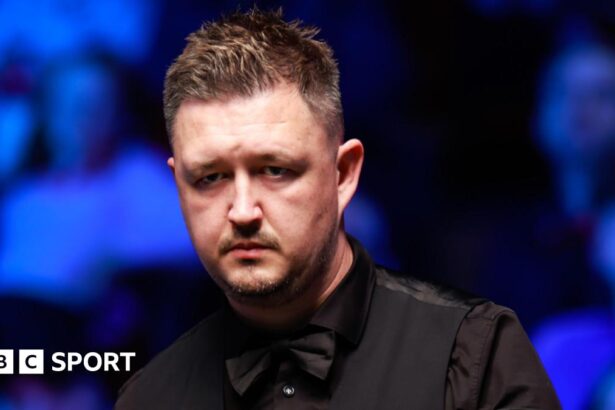 Wilson has medical attention in Tour Championship loss to Ding